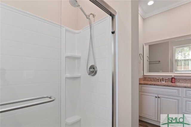 620 W 9th St, Rincon, GA 31326 - full bath with a shower stall, ornamental molding, and vanity