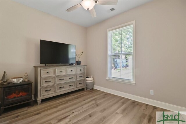 620 W 9th St, Rincon, GA 31326 - interior space featuring baseboards, a ceiling fan, and light wood-style flooring