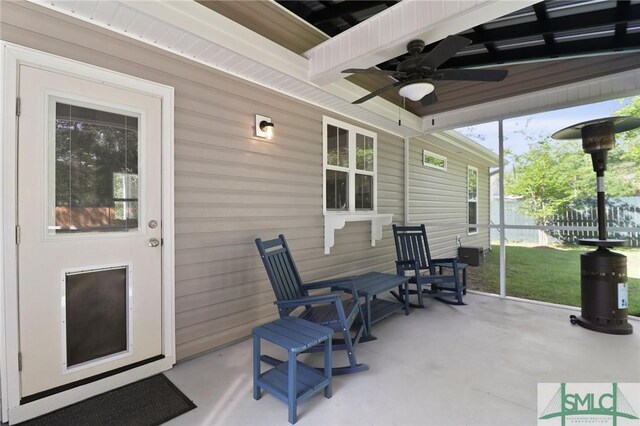 620 W 9th St, Rincon, GA 31326 - view of patio featuring fence and ceiling fan