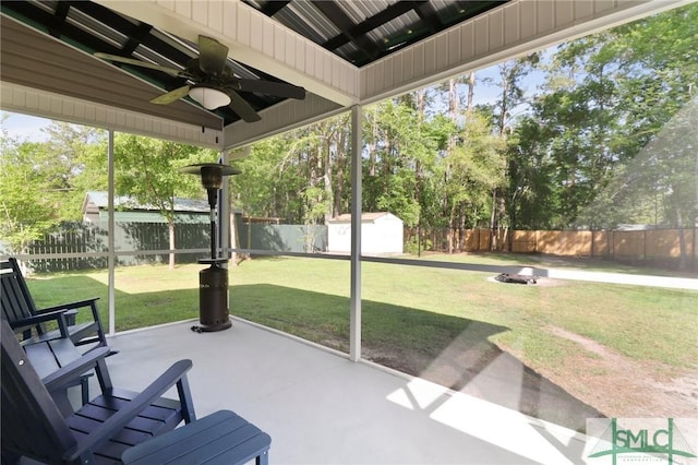 620 W 9th St, Rincon, GA 31326 - view of patio with a ceiling fan, an outbuilding, a shed, and a fenced backyard