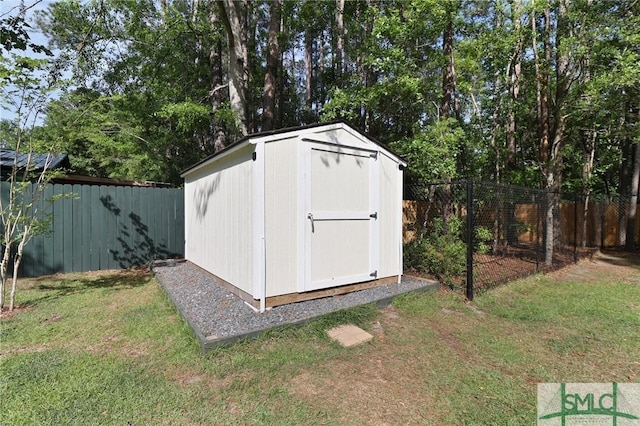 620 W 9th St, Rincon, GA 31326 - view of shed featuring a fenced backyard