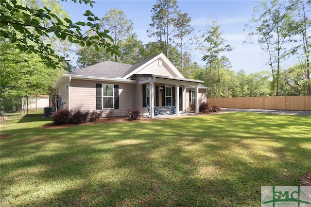 620 W 9th St, Rincon, GA 31326 - rear view of property featuring a patio area, fence, central air condition unit, and a yard