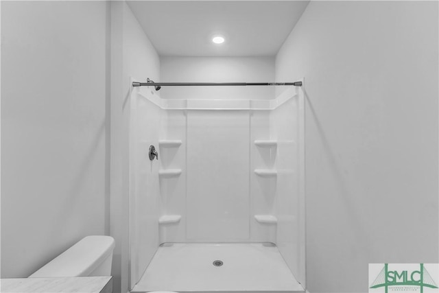 19 Arrowhead Way, Port Wentworth, GA 31407 - bathroom featuring walk in shower, toilet, and vanity