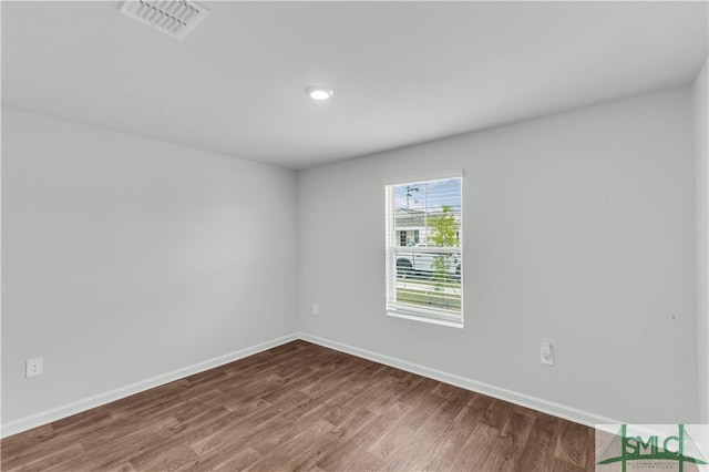 19 Arrowhead Way, Port Wentworth, GA 31407 - empty room with visible vents, wood finished floors, and baseboards