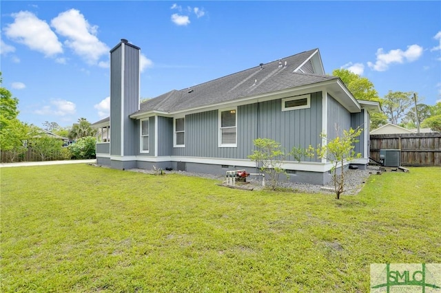 116 Rose Dhu Way, Savannah, GA 31419 - back of property featuring a chimney, board and batten siding, and roof with shingles