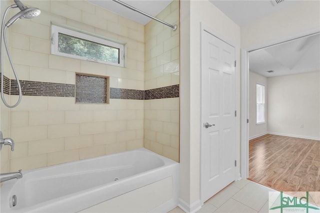 116 Rose Dhu Way, Savannah, GA 31419 - bathroom with healthy amount of natural light, shower / tub combination, and tile patterned floors