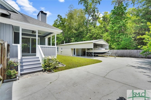116 Rose Dhu Way, Savannah, GA 31419 - view of patio / terrace with a detached carport, a ceiling fan, and driveway