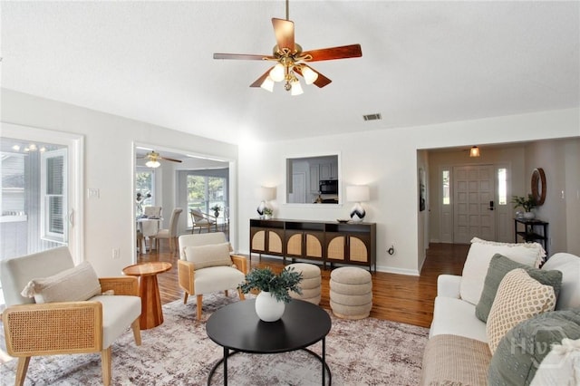 116 Rose Dhu Way, Savannah, GA 31419 - living room featuring a ceiling fan, wood finished floors, and vaulted ceiling