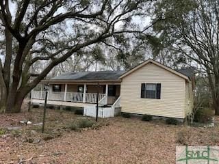 view of front of property with covered porch