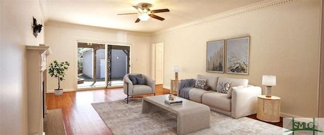 living room with wood finished floors, a ceiling fan, crown molding, and baseboards