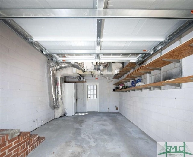 garage featuring freestanding refrigerator
