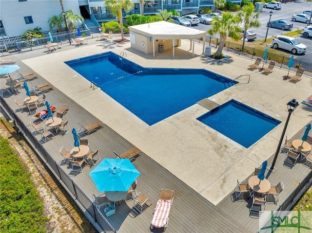 1217 Bay St Unit 230A, Tybee Island, GA 31328 - community pool featuring fence and a patio area