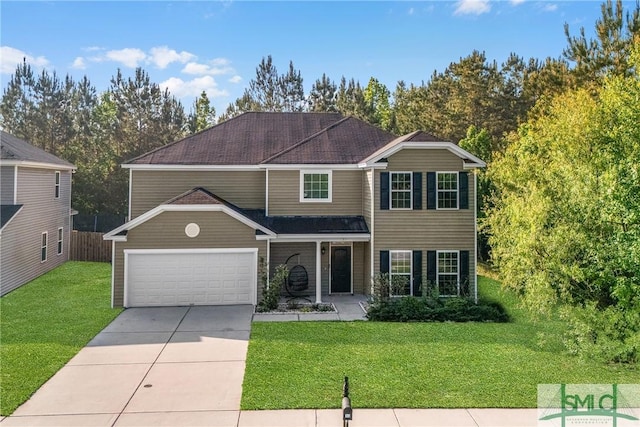 traditional-style house with covered porch, an attached garage, concrete driveway, and a front lawn