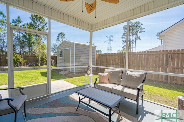 sunroom with an outdoor hangout area and a ceiling fan