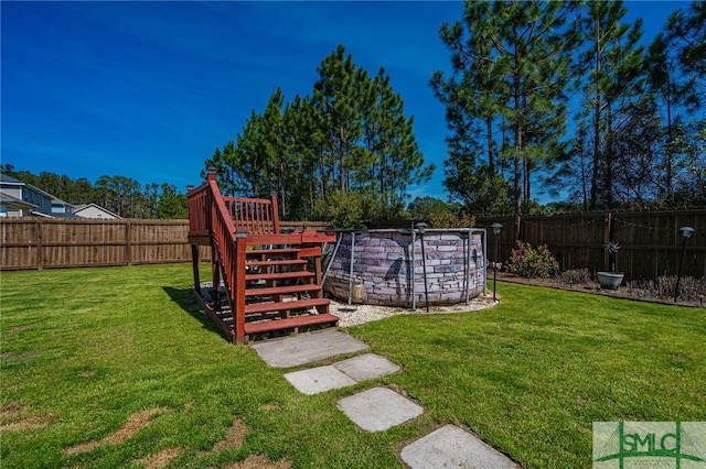 view of yard featuring a fenced backyard