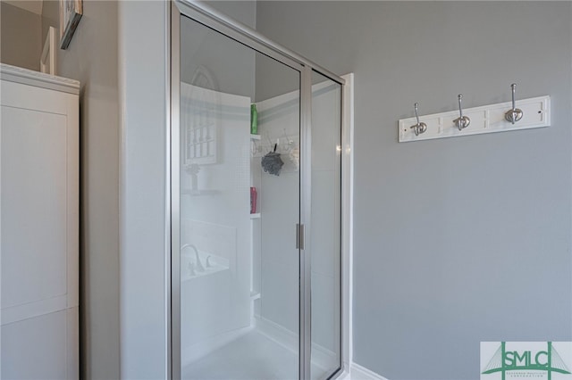bathroom with a stall shower