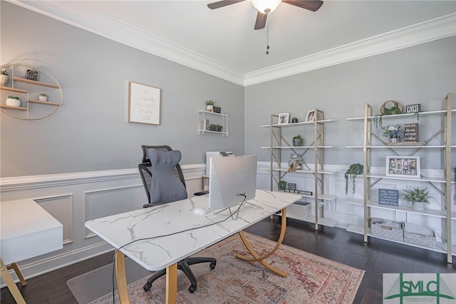 office with crown molding, a ceiling fan, wainscoting, and dark wood finished floors
