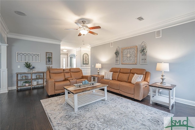 living room with crown molding, visible vents, ceiling fan, baseboards, and dark wood-style flooring