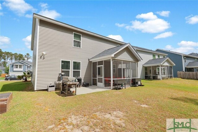 378 Southwilde Way, Pooler, GA 31322 - rear view of property featuring a lawn, a patio area, and a sunroom