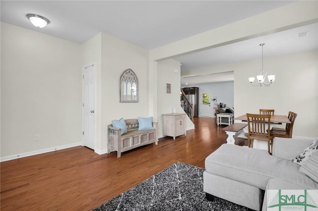 378 Southwilde Way, Pooler, GA 31322 - living room with visible vents, wood finished floors, baseboards, stairway, and a notable chandelier
