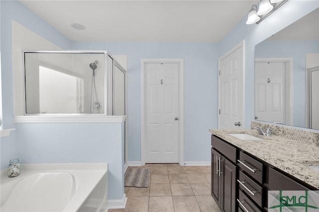 378 Southwilde Way, Pooler, GA 31322 - full bathroom featuring tile patterned flooring, double vanity, a bath, a sink, and a stall shower