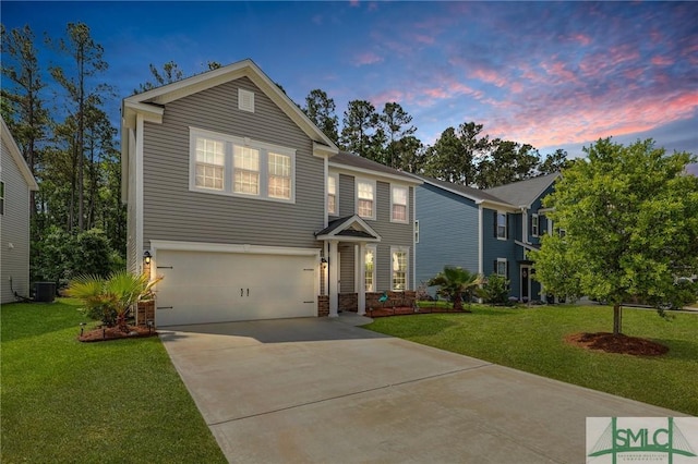 378 Southwilde Way, Pooler, GA 31322 - traditional home with an attached garage, concrete driveway, central AC, and a front yard