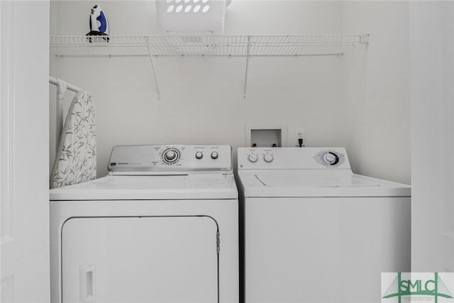 1609 Strand Ave Unit 206, Tybee Island, GA 31328 - washroom with washing machine and clothes dryer