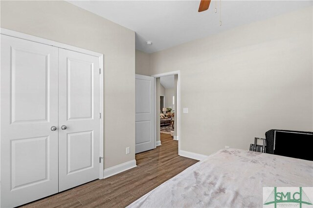 107 Mingledorff Way, Springfield, GA 31329 - bedroom with wood finished floors, a closet, a ceiling fan, and baseboards