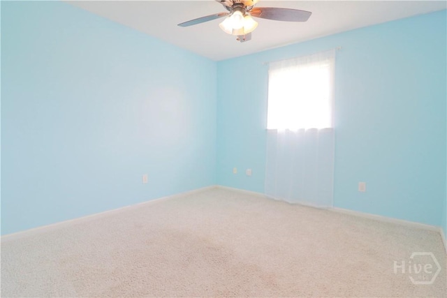 309 Wilkinson Rd NE, Ludowici, GA 31316 - carpeted empty room with ceiling fan and baseboards