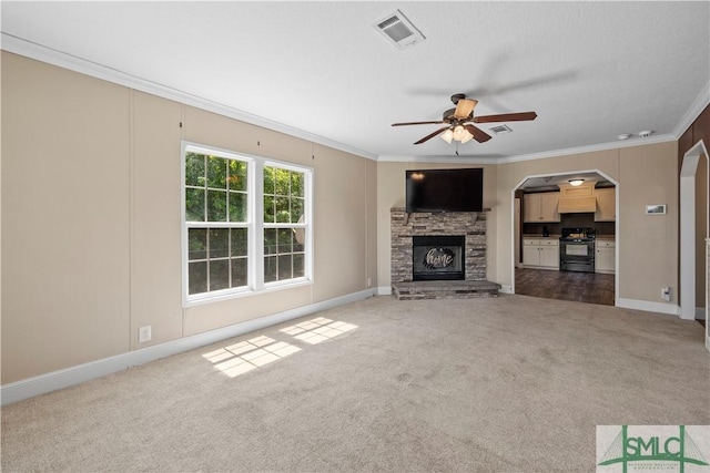 1173 Ga Highway 21 N, Springfield, GA 31329 - unfurnished living room featuring crown molding, visible vents, ceiling fan, and carpet flooring