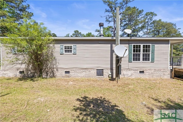1173 Ga Highway 21 N, Springfield, GA 31329 - view of side of home featuring a lawn and crawl space