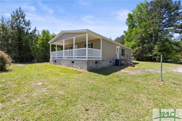 1173 Ga Highway 21 N, Springfield, GA 31329 - view of front of house with cooling unit, a front lawn, and crawl space