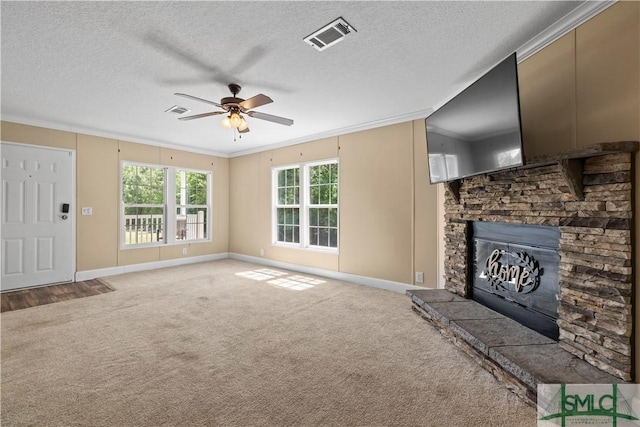 1173 Ga Highway 21 N, Springfield, GA 31329 - unfurnished living room featuring a ceiling fan, visible vents, a stone fireplace, and baseboards
