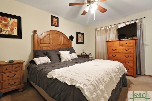 bedroom featuring a ceiling fan and light colored carpet