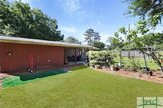 view of yard with fence