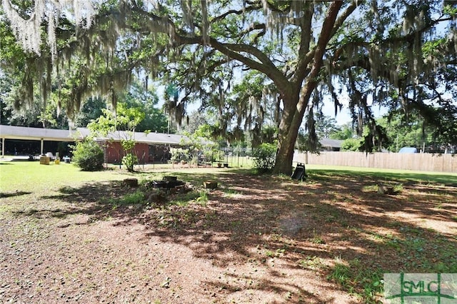 view of yard with fence