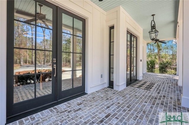 31 Tivoli Ln, Richmond Hill, GA 31324 - view of exterior entry featuring covered porch and french doors