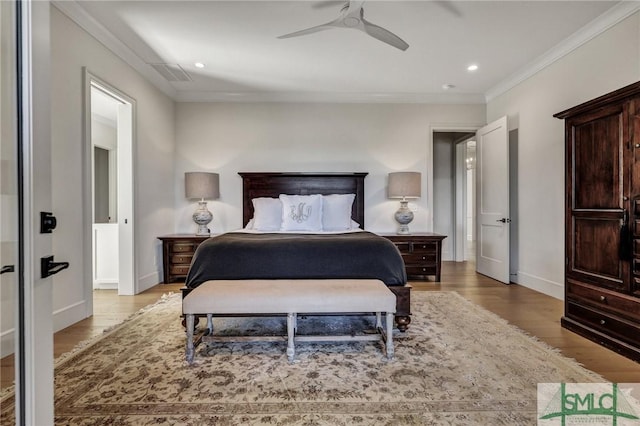 31 Tivoli Ln, Richmond Hill, GA 31324 - bedroom featuring recessed lighting, crown molding, visible vents, baseboards, and wood finished floors