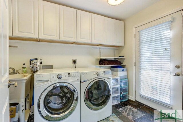 8 Baker Dr, Savannah, GA 31410 - washroom with baseboards, a sink, cabinet space, and independent washer and dryer