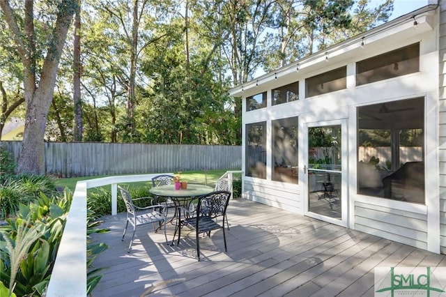 8 Baker Dr, Savannah, GA 31410 - deck featuring a fenced backyard and outdoor dining space