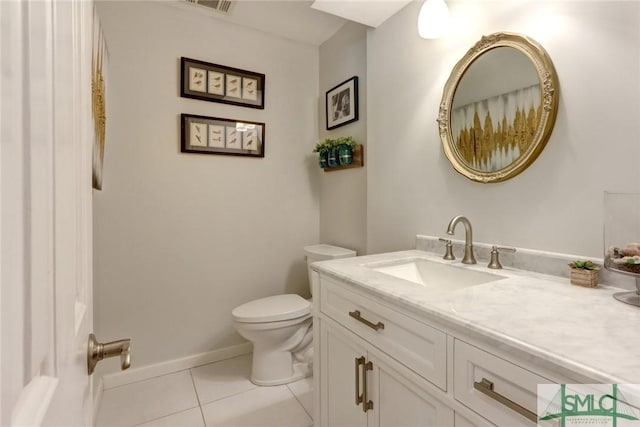 8 Baker Dr, Savannah, GA 31410 - half bathroom with vanity, toilet, tile patterned floors, baseboards, and visible vents