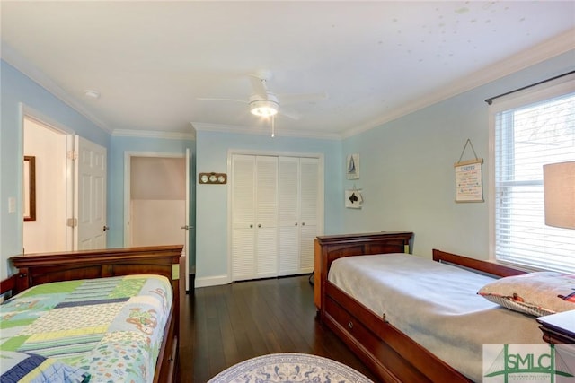 8 Baker Dr, Savannah, GA 31410 - bedroom featuring dark wood-style flooring, a ceiling fan, ornamental molding, and a closet