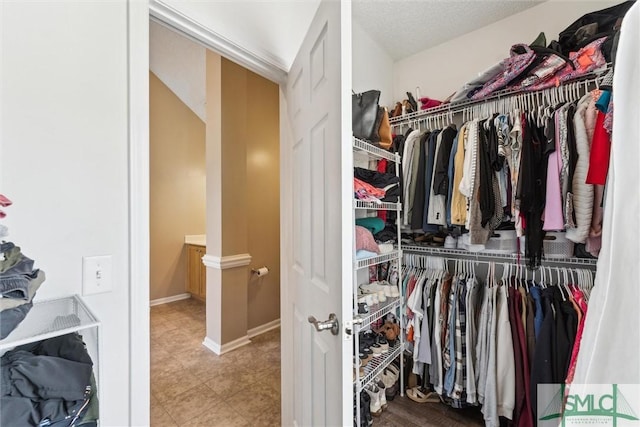 125 Blue Lake St, Richmond Hill, GA 31324 - spacious closet with tile patterned flooring