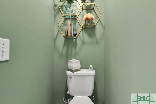 half bathroom with toilet