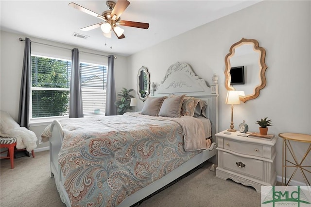 bedroom with visible vents, ceiling fan, light carpet, and baseboards