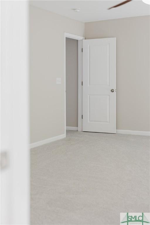 154 Hamilton Grove Dr, Pooler, GA 31322 - empty room with light colored carpet and baseboards