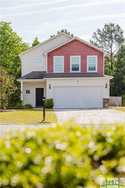 154 Hamilton Grove Dr, Pooler, GA 31322 - view of front of property featuring a garage, fence, and concrete driveway
