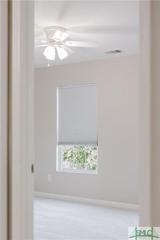 154 Hamilton Grove Dr, Pooler, GA 31322 - spare room with baseboards, visible vents, and ceiling fan