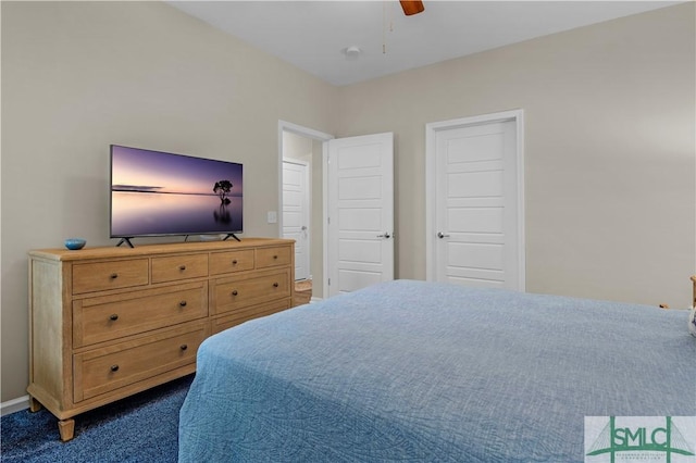 21 Shoefstall St, Savannah, GA 31407 - bedroom featuring dark colored carpet, a ceiling fan, and baseboards