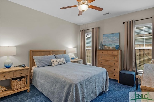 21 Shoefstall St, Savannah, GA 31407 - bedroom with a ceiling fan, visible vents, and dark colored carpet
